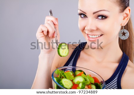 happy healthy woman with salad