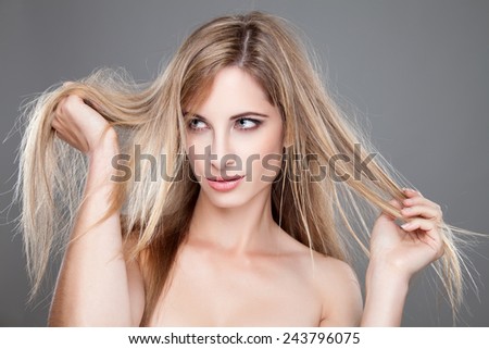Beautiful woman with long and straight messy hair