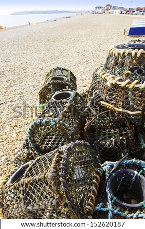 lobster pots on seaford beach east sussex uk