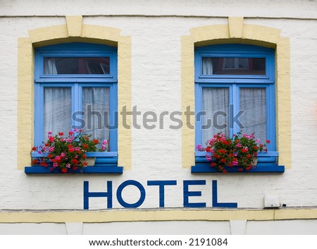 hotel in french town with hotel written on wall