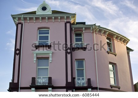 pink house sea front holiday resort town of dawlish devon england uk