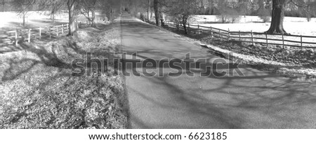 country lane the baddesley clinton estate warwickshire midlands england uk infra red black and white image