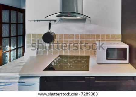 colour image kitchen in newly restored rebuilt house work surfaces