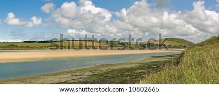 view from the camel trail cycleway and footpath along disused railway line the estuary of the river camel padstow and rock cornish coast cornwall england uk