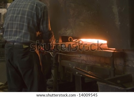 Inside a factory making manufactured goods with steel.