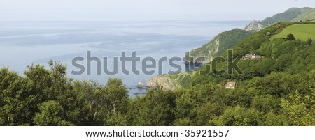 the coast of the valley of the rocks lynton devon from the coastal path to lynmouth - looking down on woody bay