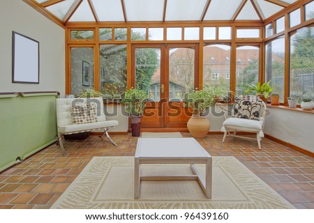 conservatory tables chairs plants room in house next to garden