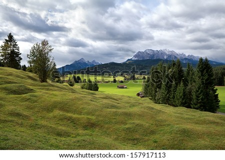 green alpine meadows and Karwendel mountains in Bavaria