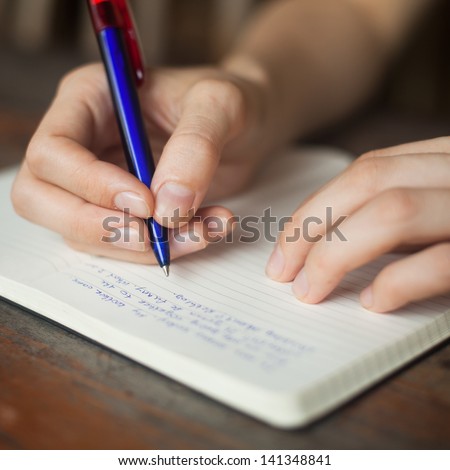 Handwriting, Hand Writes A Pen In A Notebook