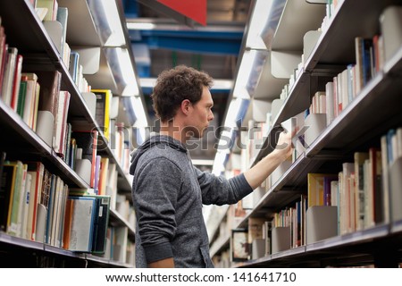 Student In Book Shop Or Library