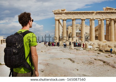tourist looking at Parthenon, Acropolis ruin, Athens, Greece