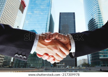 partnership, cooperation of two companies, deal of two businessmen