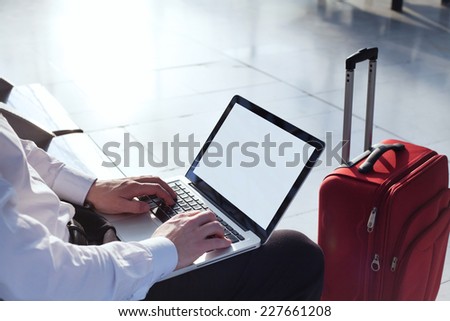 online banking on internet in business travel, laptop with empty screen
