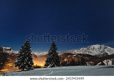 beautiful christmas landscape with night stars on blue winter sky