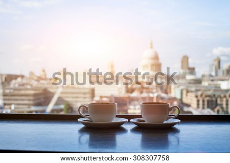 cafe with view of London, two cups of coffee and St Paul cathedral