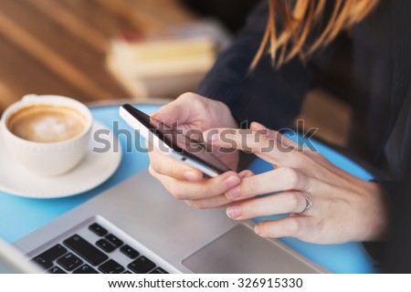 mobile internet, wifi connection on smartphone in cafe