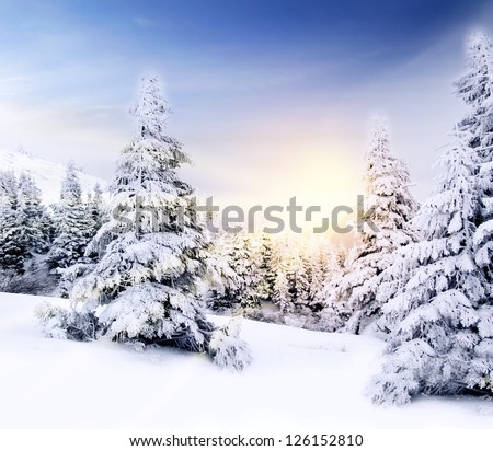 Beautiful winter mountains landscape at sunset in rays of sun light. Illustration, card, poster, space for text