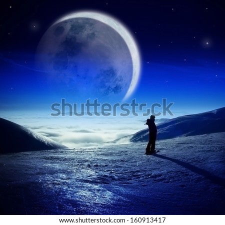 Fantastic winter night landscape in high mountains over the clouds, Woman watching majestic huge moon