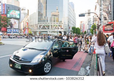 TOKYO, JAPAN - JULY 21: Shibuya crossing is one of the most famed examples of a scramble crosswalk in the world on July 21, 2011 in Tokyo, Japan.