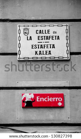 Estafeta street with a sign of the direction of the famous running of the bulls in San Fermin