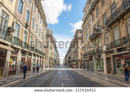LISBON, PORTUGAL - JULY 27: street Rua da Prata in Lisbon, Portugal on July 27, 2013. It is one of the main streets of Baixa Pombalina. It was built after the 1755 earthquake