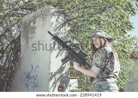 Spanish military girl with his machine gun