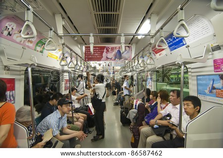 TOKYO, JAPAN - JULY 5: inside the Tokyo subway on July 5, 2011 in Tokyo, Japan.  The Tokyo Metro has 13 lines and 274 stations