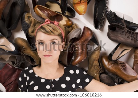 Woman with many shoes
