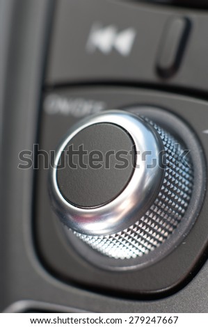 Car radio control buttons closeup.