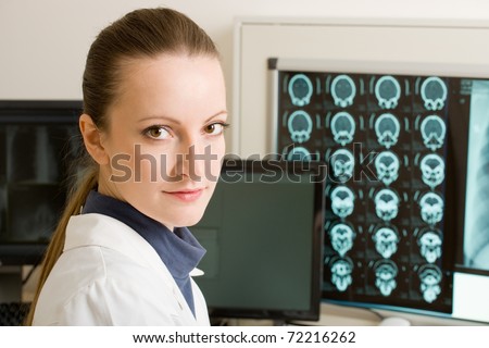 Female doctor in diagnostic center with mri scan