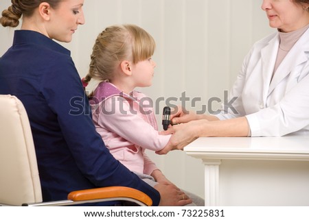 Mother and her daughter during visit at the neurologist\'s office