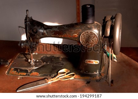 Antique sewing machine in work shop