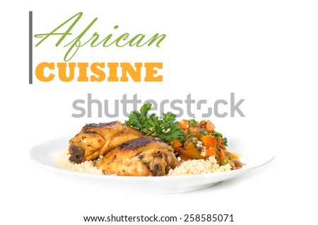 African cuisine concept with chicken thigh on couscous rice with copy space
