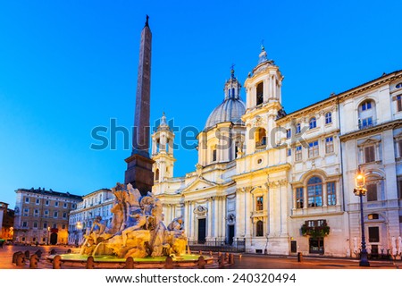 The fountain of the four Rivers with Egyptian obelisk at twilight, Piazza Navona, Rome, Italy