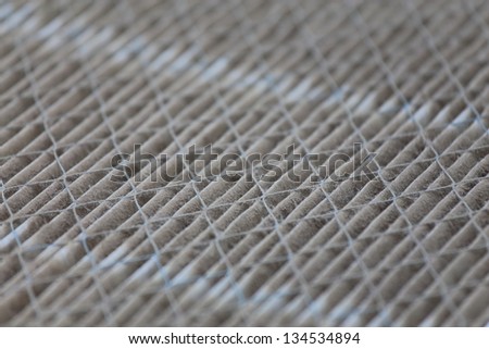Close up view of a dirty house air filter that needs to be replaced
