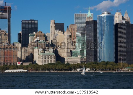 Close View of Downtown Manhattan\'s East-facing skyline in New York, NY, USA, with the Freedom Tower under construction on the left edge.
