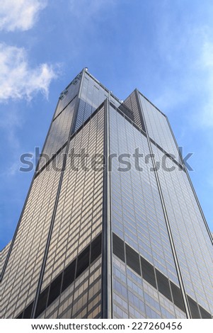 CHICAGO, IL, USA - OCTOBER 11, 2014: View straight up at blue skies and Willis Tower in Chicago, IL, USA on October 11, 2014.