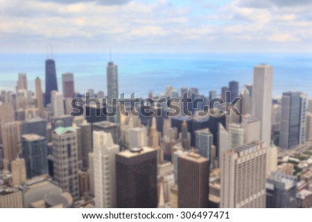 Blurred background of aerial view of the downtown Chicago cityscape from Willis Tower in Chicago, IL, USA.