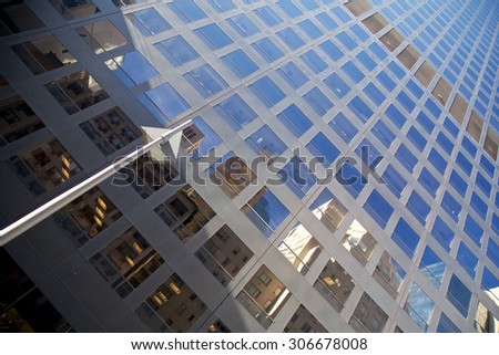 View up the facade of an office tower in New York, NY, USA.