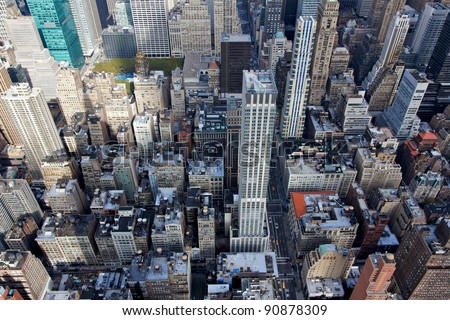 A view tumbling down into midtown Manhattan with Bryant Park and 5th Avenue.
