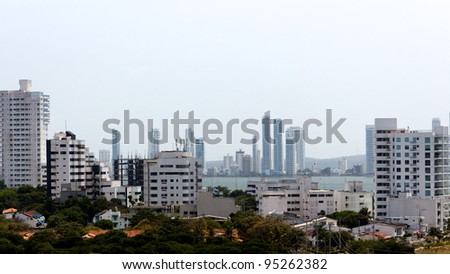 A view of apartment towers forming a white skyline in Cartagena de Indias, Colombia.