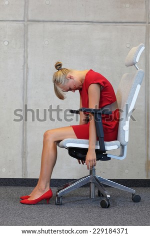 office occupational disease prevention - business woman exercising on chair
