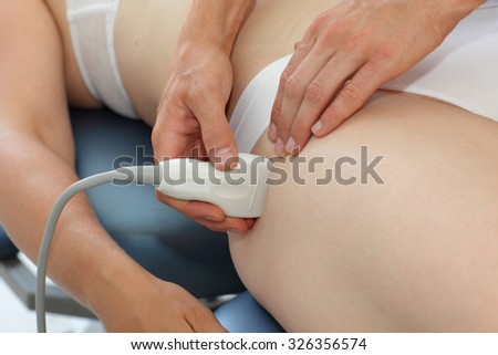 Ultrasound of woman\'s hip joint - diagnosis