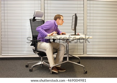 Near-sightedness,  myopia,bad posture Office worker at work station