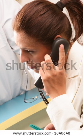Medical secretary on the phone