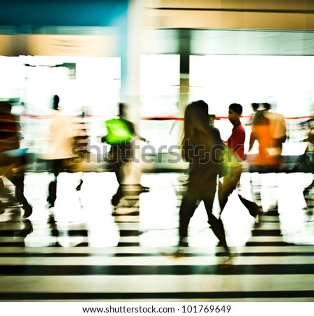 people moving in the office lobby deliberately blurred action,abstract image