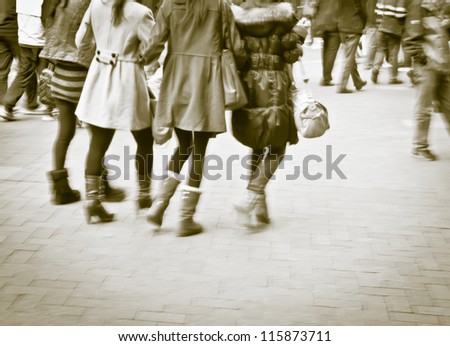 abstract image of city people crowd on the street blurred motion