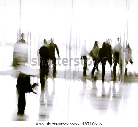 city business people moves in the office lobby, abstract blurred motion?Black and white images