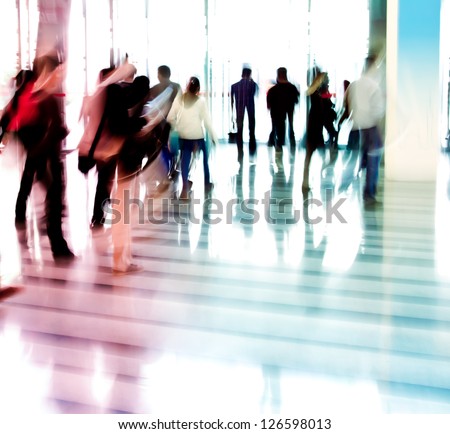 city business people walking in the lobby blur motion