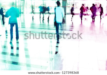 city business people rushing in the lobby,abstract blurred motion background